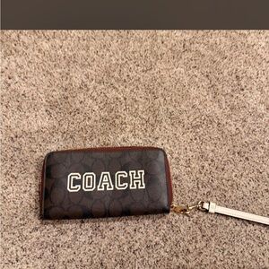 Coach Brown Signature Zip Wristlet with Cream Strap